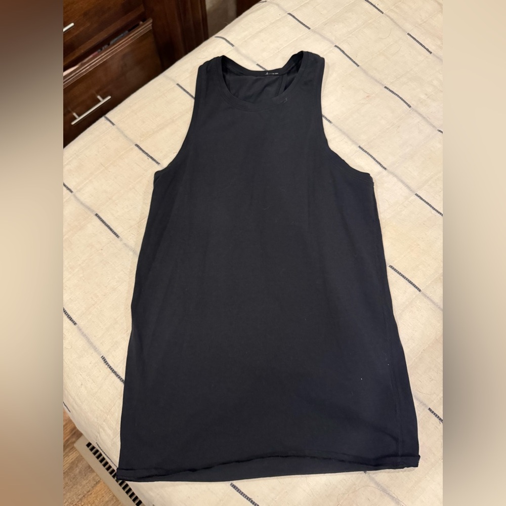 Black Lululemon open tie back tank 
No flaws
